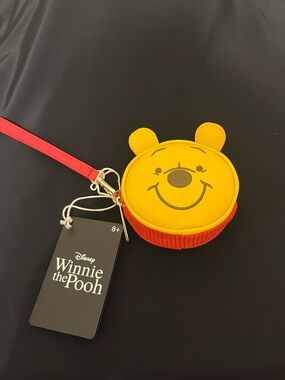 Disney Winnie the Pooh Round Wristlet — Yellow & Red